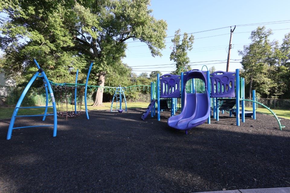 A picture of a playground at Centennial Park. 