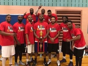 Men's League Basketball Team with First-Place Trophy